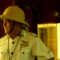 Buy canvas prints of North Borneo Train Conductor by Mark McDermott