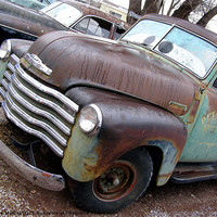 Buy canvas prints of Chevy Pick-up rusting away by Lee Mullins