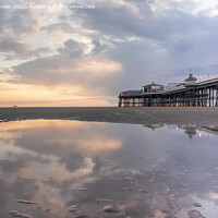 Buy canvas prints of Reflecting sunset at Blackpool's North Pier by Gary Kenyon