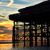 Buy canvas prints of Sunset at Central Pier Blackpool by Gary Kenyon
