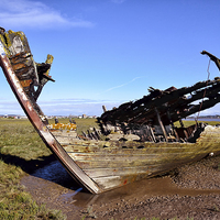 Buy canvas prints of Wooden Wreck by Gary Kenyon