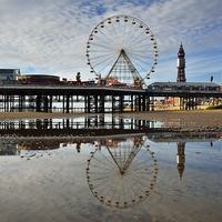 Buy canvas prints of Reflections Of Central Pier on Blackpools Beach by Gary Kenyon