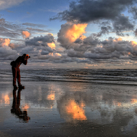 Buy canvas prints of Sunset Photographer On The Beach by Gary Kenyon