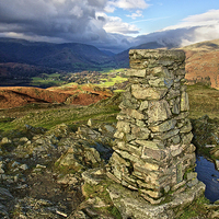 Buy canvas prints of  Loughrigg Trig Point by Gary Kenyon
