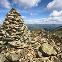 Buy canvas prints of  Swirl How Summit Cairn by Gary Kenyon