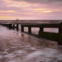Buy canvas prints of Sunset Waves Cleveleys by Gary Kenyon