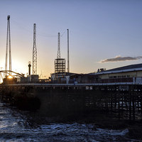 Buy canvas prints of South Pier Sunset Blackpool by Gary Kenyon