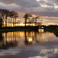 Buy canvas prints of Sunset On The Lancaster Canal by Gary Kenyon