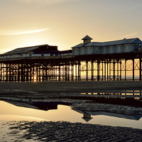 Buy canvas prints of Sunset Central Pier Blackpool by Gary Kenyon