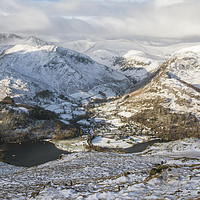 Buy canvas prints of Snowy view from up Place Fell In The Lake District by Gary Kenyon