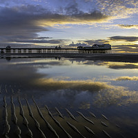 Buy canvas prints of Sunset Reflections By North Pier by Gary Kenyon