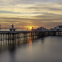Buy canvas prints of Sunset on the beach at Blackpool's North Pier by Gary Kenyon