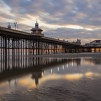 Buy canvas prints of Sunset on the beach at Blackpool by North Pier by Gary Kenyon
