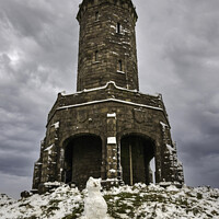 Buy canvas prints of Darwen tower and the snowman by Gary Kenyon