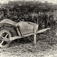 Buy canvas prints of  Old wooden wheelbarrow  by Thanet Photos