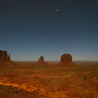 Buy canvas prints of Monument Valley by night by Lois Eley