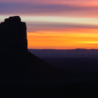 Buy canvas prints of Sunrise at Monument Valley by Lois Eley
