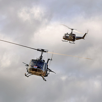 Buy canvas prints of  Bell UH-1 Iroquois Helicopters (A Pair of Hueys) by Steve H Clark