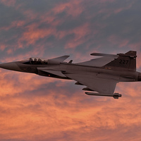Buy canvas prints of Swedish Air Force SAAB Gripen at Sunset  by Steve H Clark