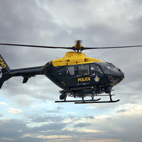 Buy canvas prints of Police Eurocopter EC135T2 by Steve H Clark