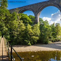 Buy canvas prints of Lambley Viaduct is a stone bridge across the River South Tyne at by Peter Stuart