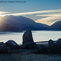 Buy canvas prints of Sunrise at the Winter solstice at Castlerigg Stone Circle near K by Peter Stuart