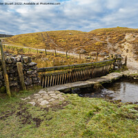 Buy canvas prints of Ford crossing a river on Mastiles Lane near Malham Tarn in the Yorkshire Dales by Peter Stuart