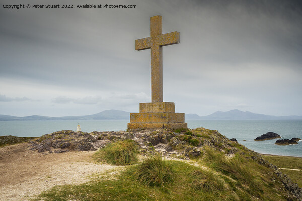 The modern Celtic cross on Llanddwyn Island commemorates the dea Picture Board by Peter Stuart