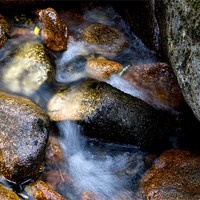 Buy canvas prints of Soft water through rocks by Sharon Kingston