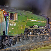 Buy canvas prints of Flying Scotsman at night. by David Birchall