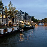 Buy canvas prints of Evening in Amsterdam. by David Birchall