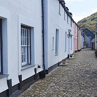 Buy canvas prints of Cottages and cobbles at Boscastle. by David Birchall