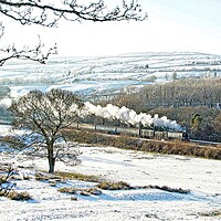 Buy canvas prints of Steam train in a snowy landscape. by David Birchall