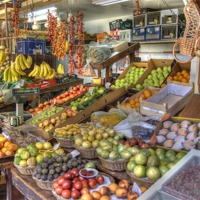 Buy canvas prints of Funchal fruit market. by David Birchall