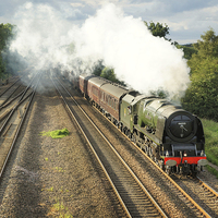 Buy canvas prints of 46233 Duchess Of Sutherland at speed. by David Birchall