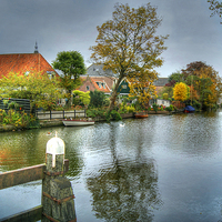 Buy canvas prints of  Dutch Waterway In Autumn by David Birchall