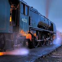 Buy canvas prints of 46233 Duchess of Sutherland at Dusk  by David Birchall