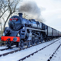 Buy canvas prints of Steam locomotive 73129 in snow. by David Birchall