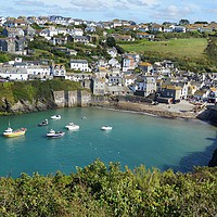 Buy canvas prints of Port Isaac harbour and village, Cornwall. by David Birchall