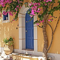 Buy canvas prints of A Colourful Welcome Home in Assos. by David Birchall