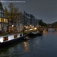 Buy canvas prints of Amsterdam Evening. by David Birchall