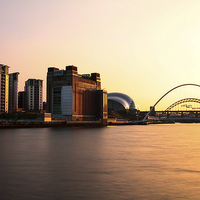 Buy canvas prints of  Golden Glow over the Tyne by Helen Holmes