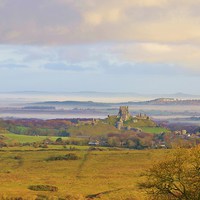 Buy canvas prints of Corfe village and Castle ruins. by Alan Sutton