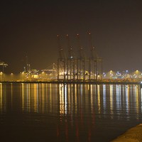 Buy canvas prints of Docks by night by Alan Sutton