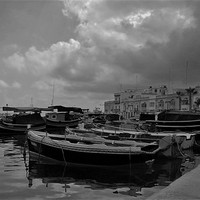 Buy canvas prints of Fishing Boat, Malta by Louise Theodorou