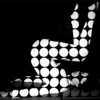 Buy canvas prints of black white spots using projection by Sara Booth