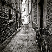Buy canvas prints of Pollensa street by Perry Johnson
