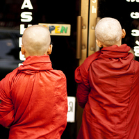 Buy canvas prints of Young Monks by Perry Johnson