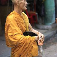 Buy canvas prints of Malaysian Monk  by Perry Johnson