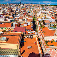 Buy canvas prints of Barcelona roof tops by Perry Johnson